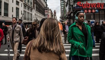 people walking through crosswalk